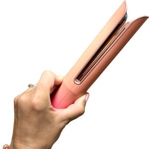 Calista AirGlide Multi-Tasking Cool Breeze Styler in Peach Mai Tai color.